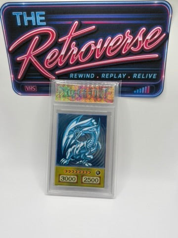 A Yu-Gi-Oh! trading card inside a clear plastic slab, displayed in front of a colorful retro neon-style sign that reads 'The Retroverse' and 'REWIND . REPLAY .